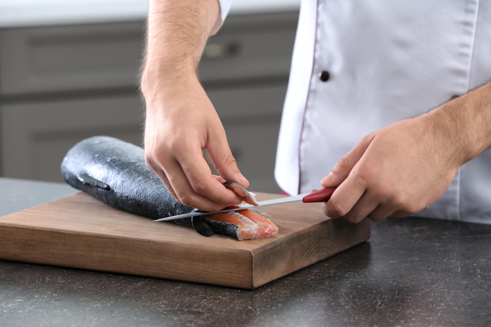 Instructor demonstrating knife skills